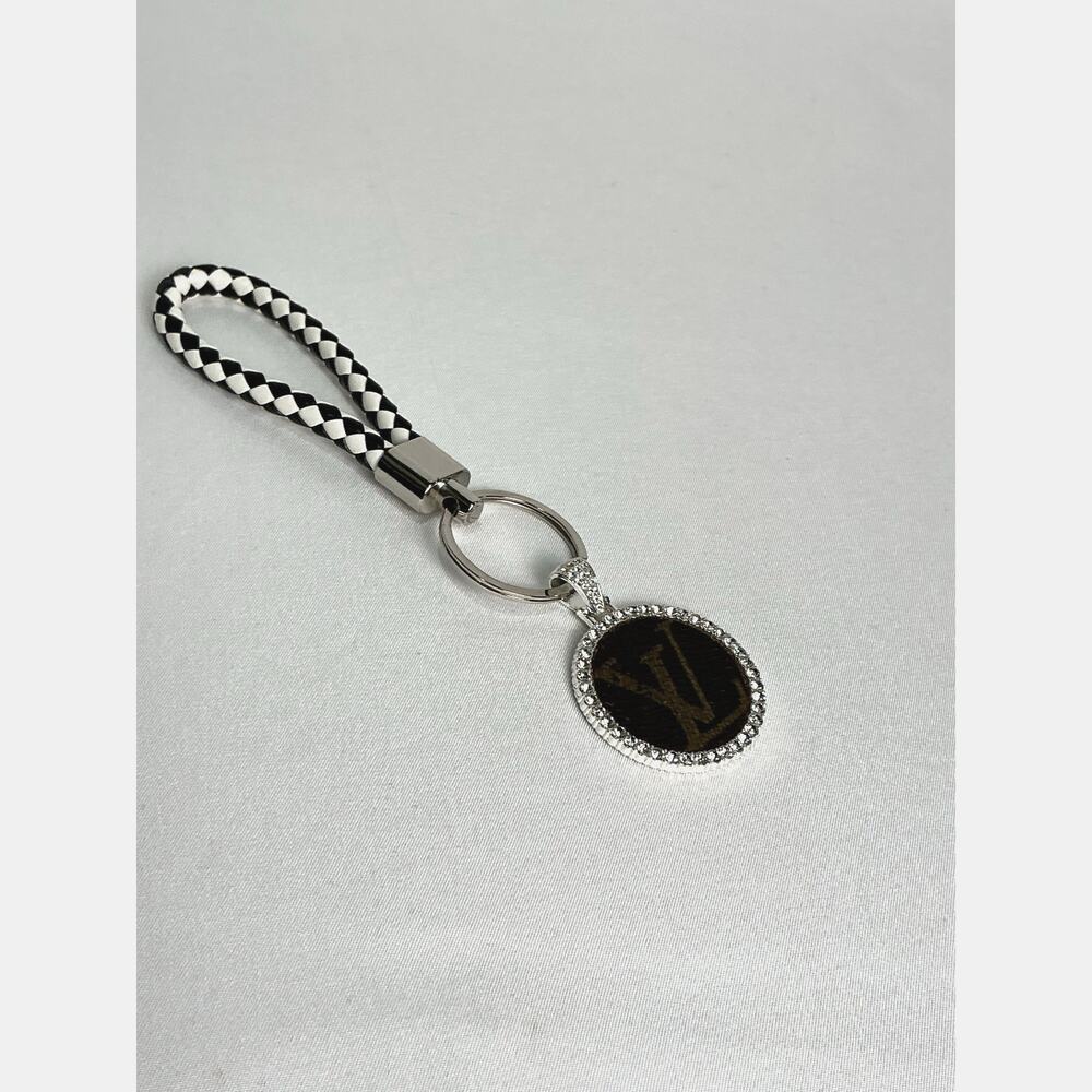 Louis Vuitton Monogram Canvas Braided leather keychain Black White woven pattern